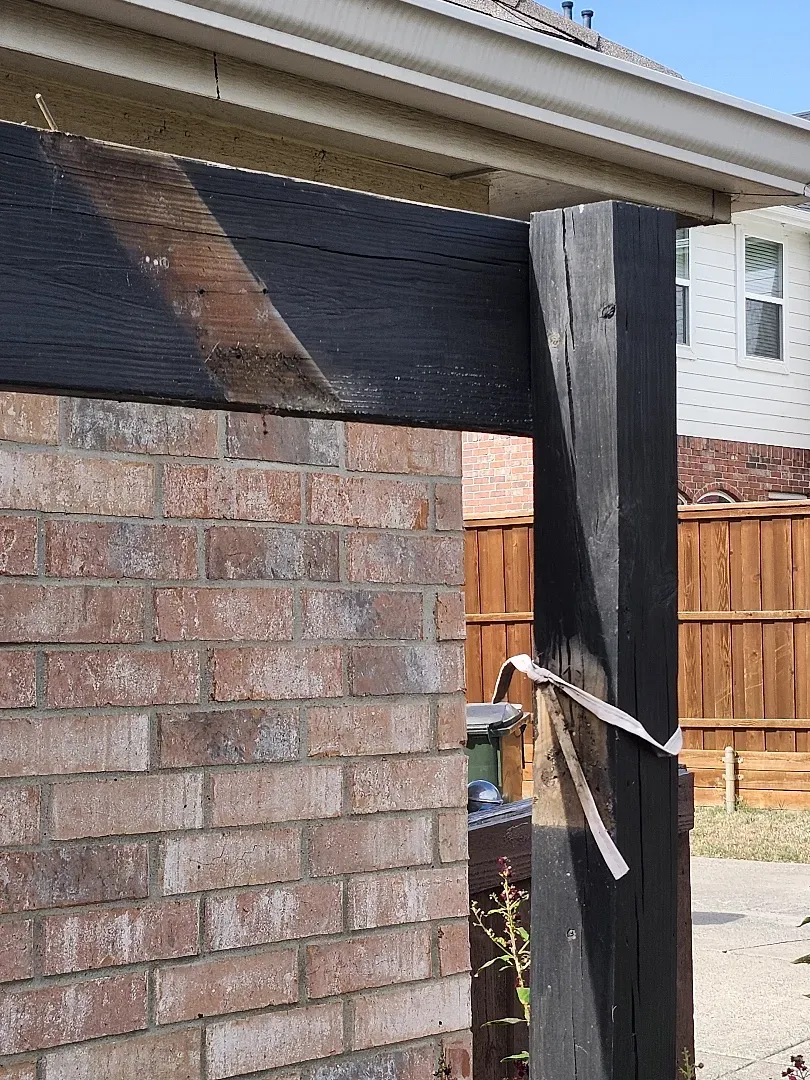 discolored wood beam and post from lack of maintenance