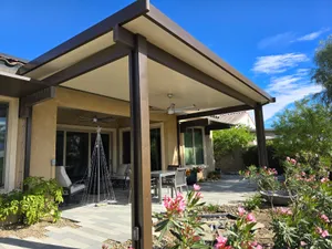 Insulated aluminum patio cover attached to a Frisco-area home